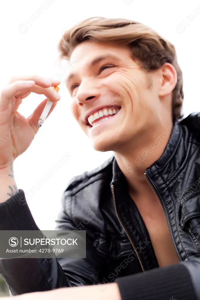 Smiling Man Smoking Cigarette