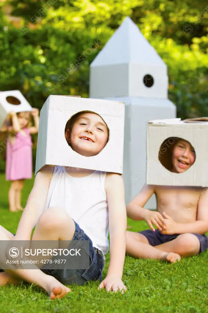 Boys Wearing Homemade Cardboard Helmets
