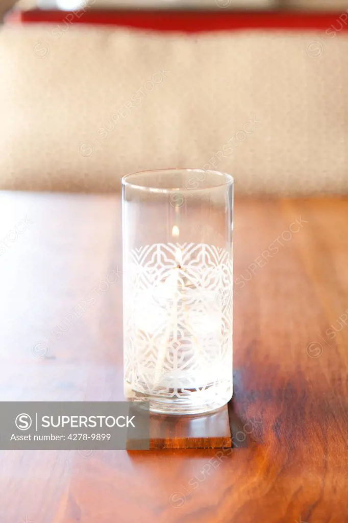 Decorative Glass Candleholder on Wooden Table