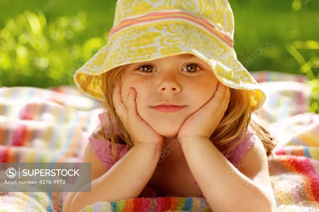 Young Girl Wearing Floppy Hat