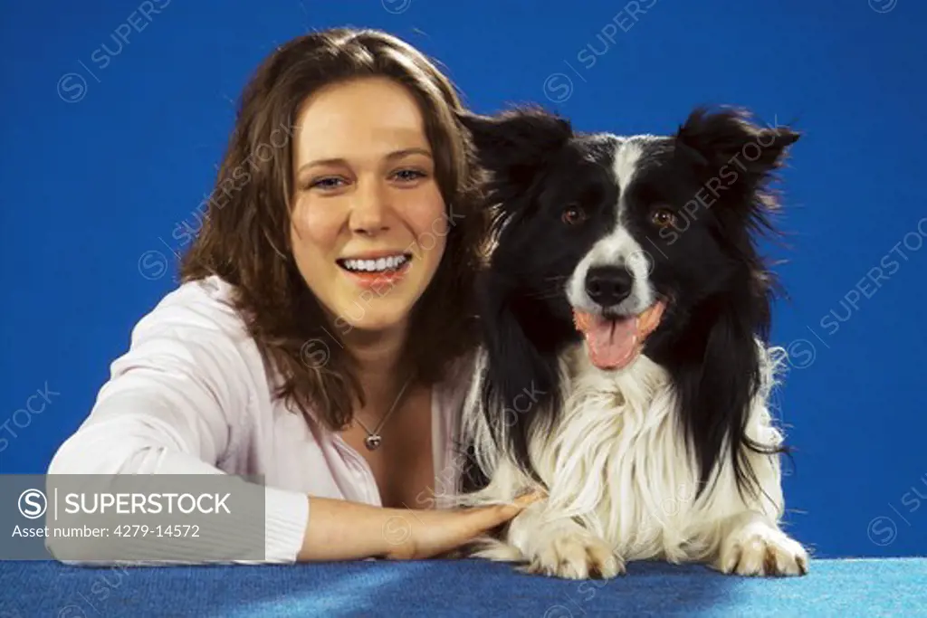 young woman next to Border Collie