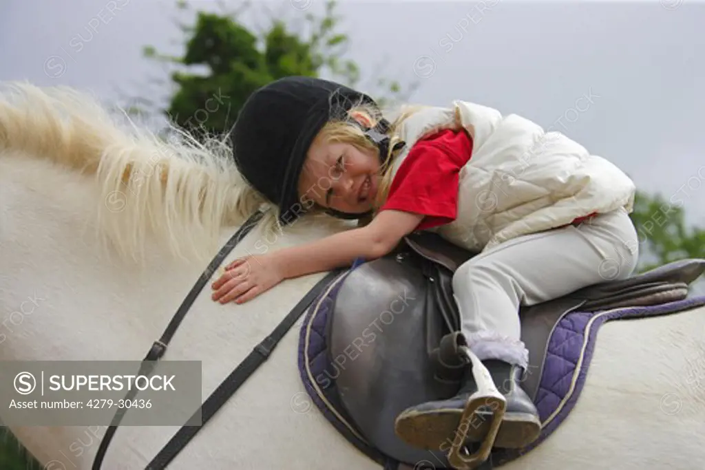 girl on Connemara horse