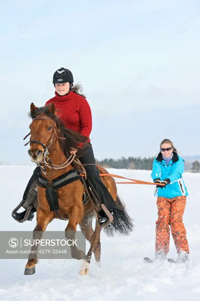 two girsl with Paso Fino horse - Skijoring