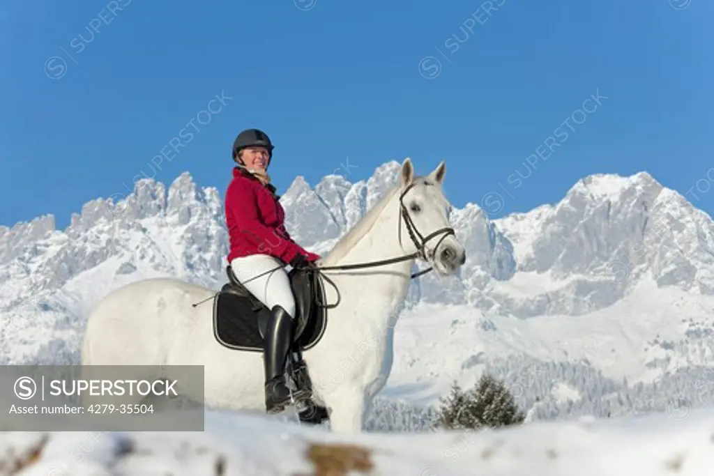 woman on Lipizzan horse in snow