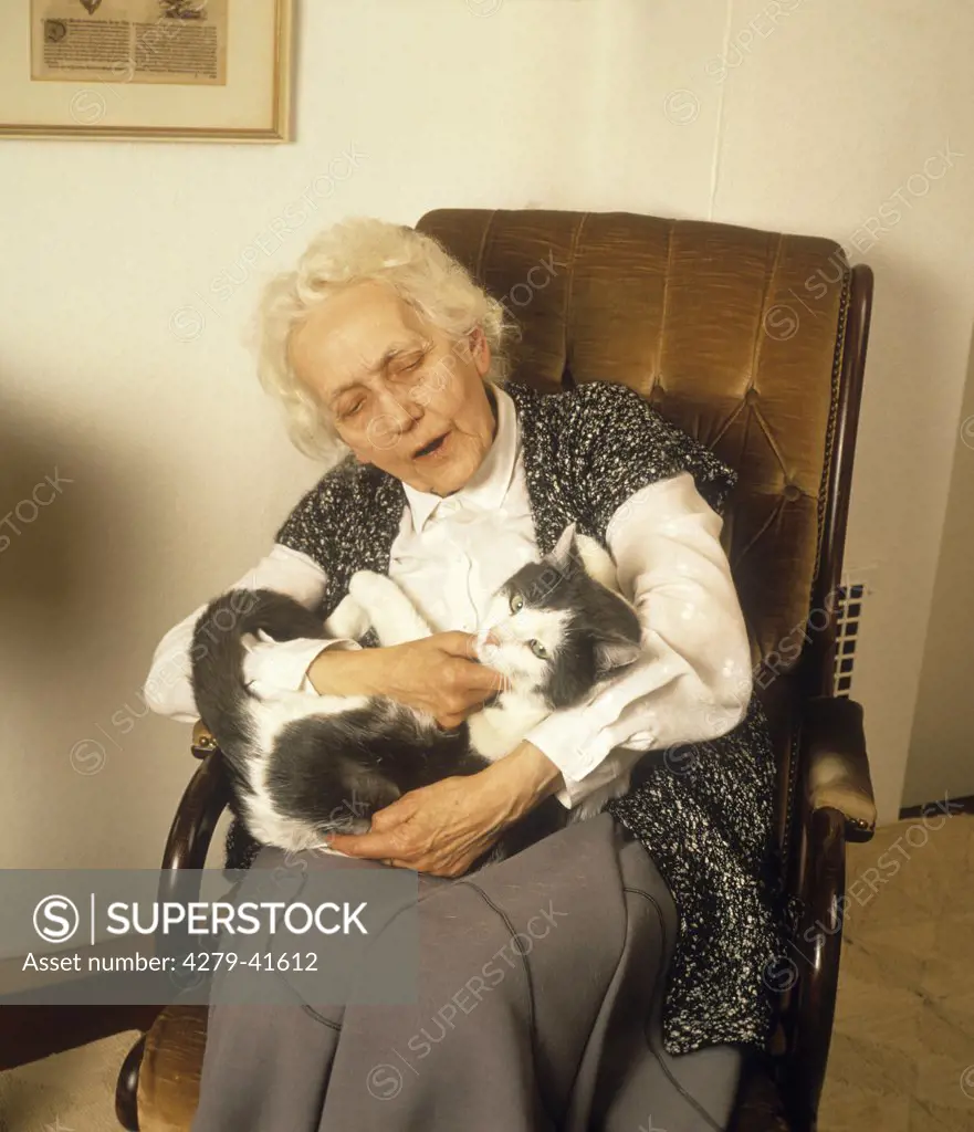 elderly woman with domestic cat