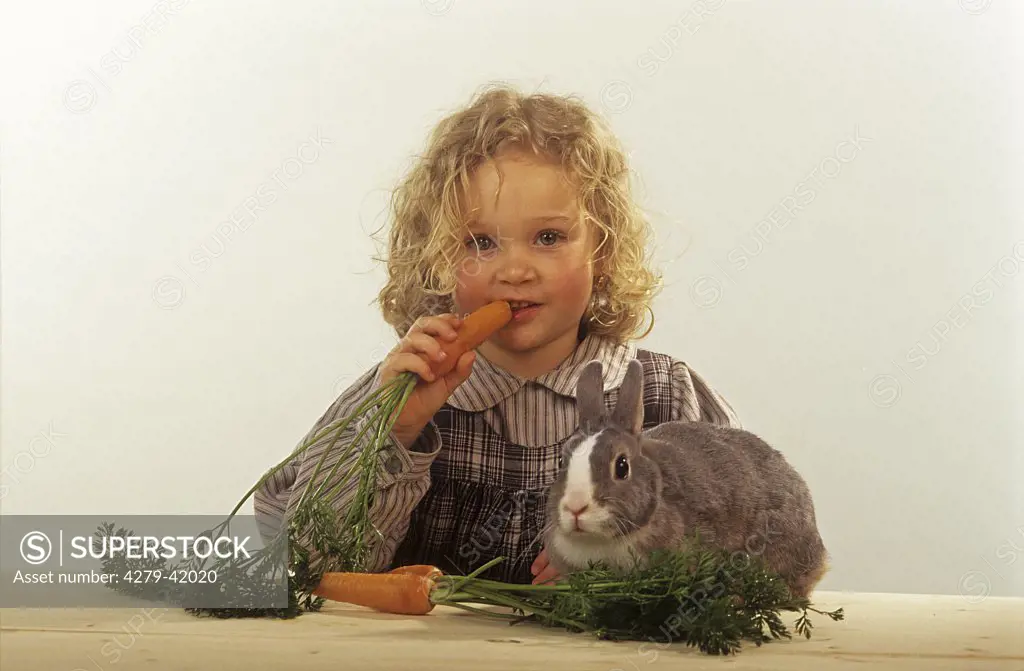 child with rabbit