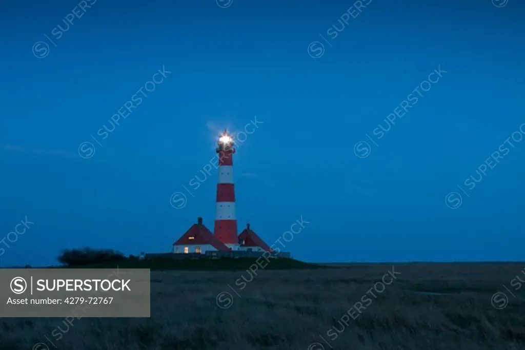 The lighthouse Westerheversand in evening light. Peninsula of Eiderstedt, North Frisia, Germany