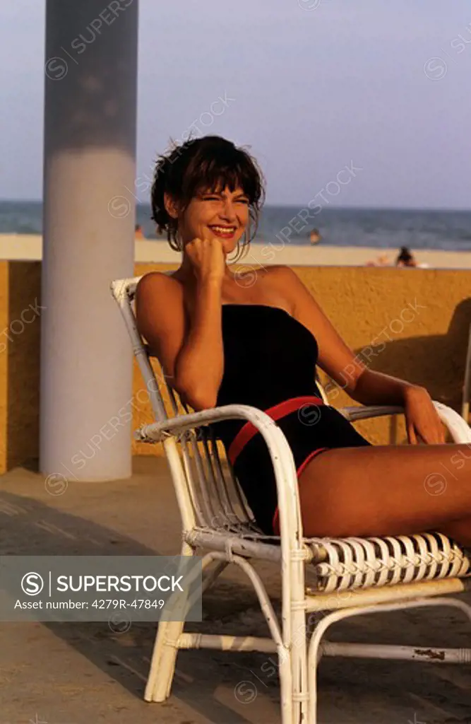 woman - sitting on chair