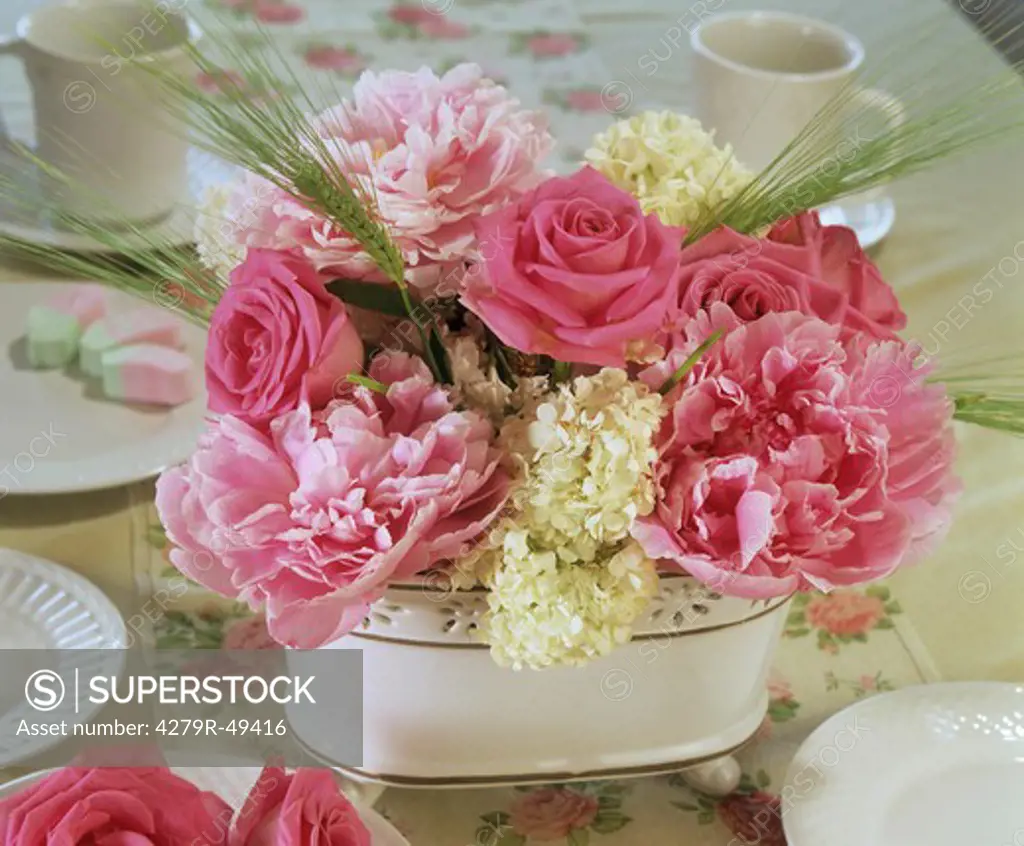 flower arrangement , roses, peonies and viburnum