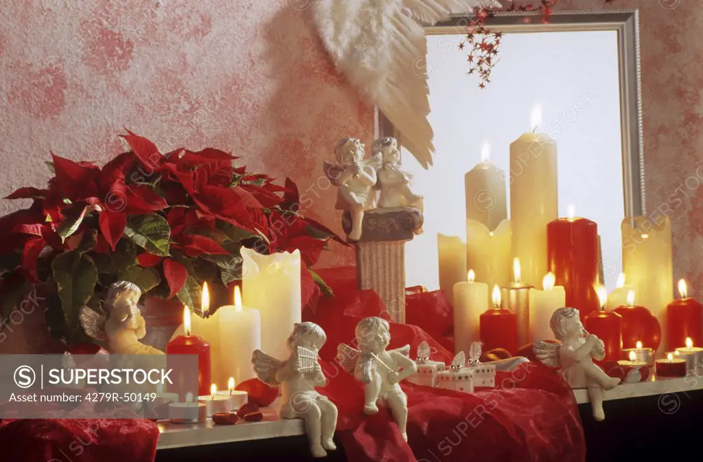 christmas , poinsettia, candles and angels