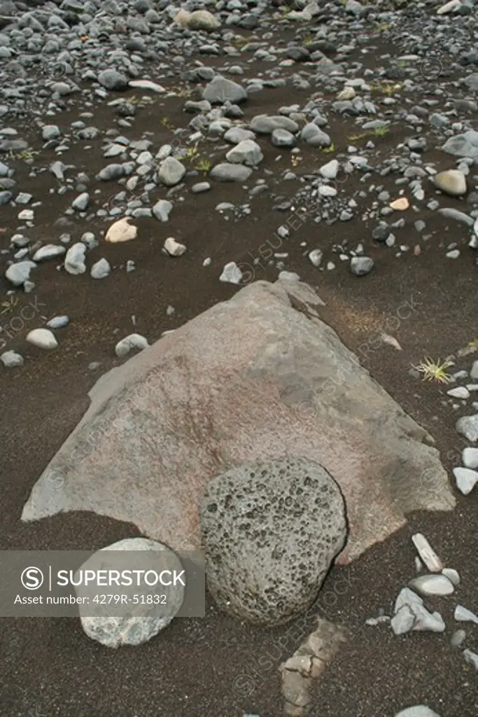 Iceland , stones in sand in þßrsmörk