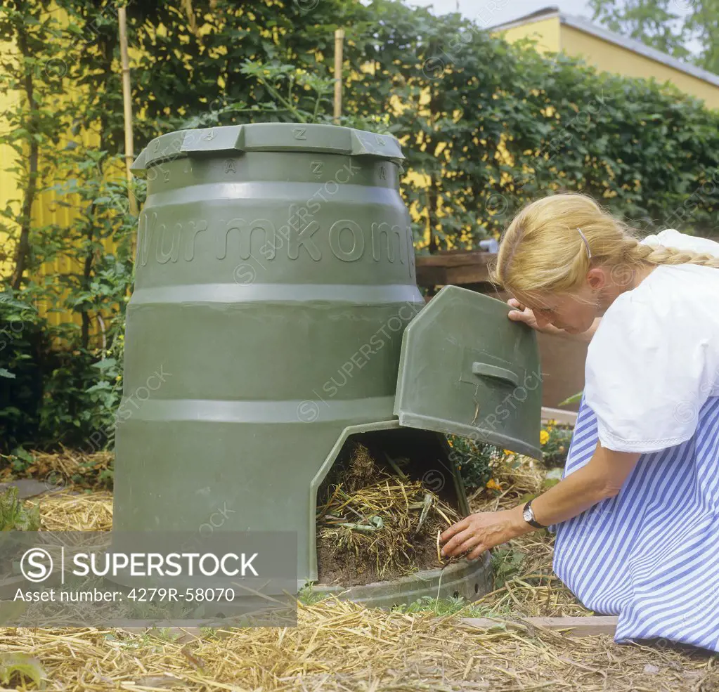 woman at compost
