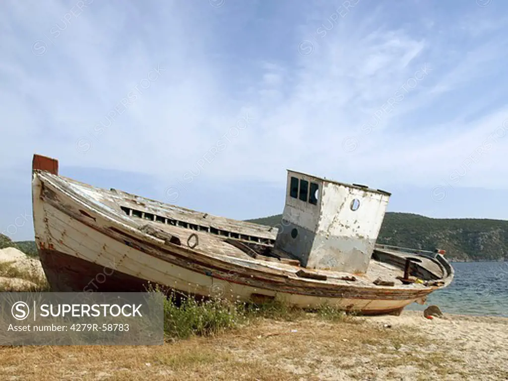 Greece - old boat at the shore