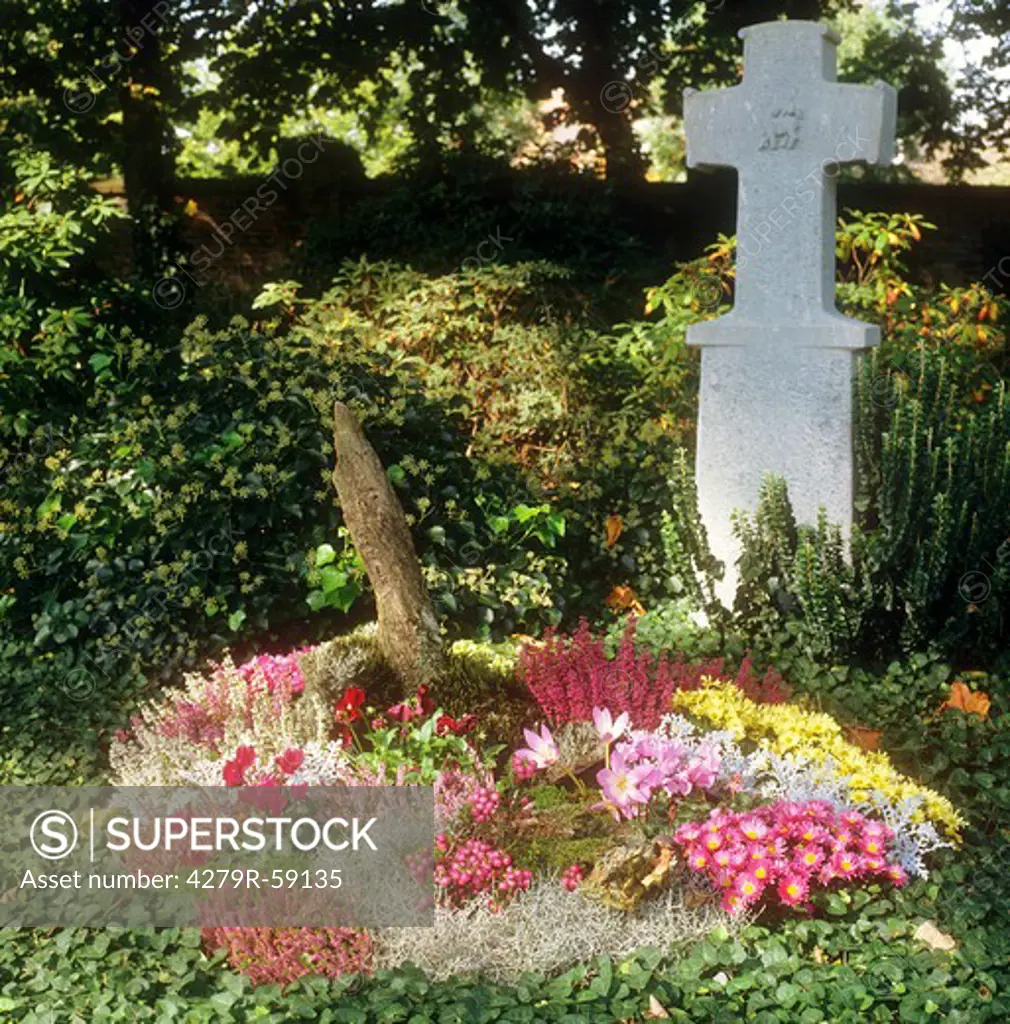 grave with different flowers