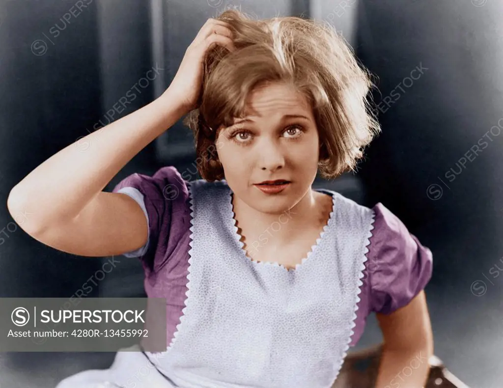 Woman scratching her head Old Visuals