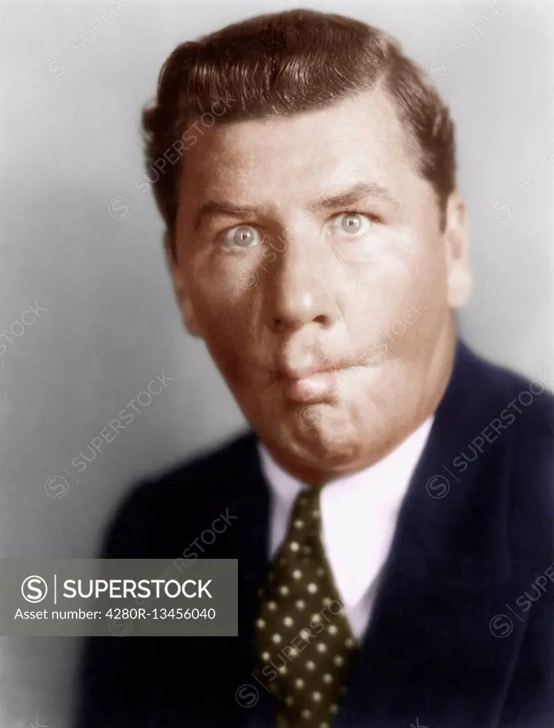 Man sucking in his cheeks Old Visuals