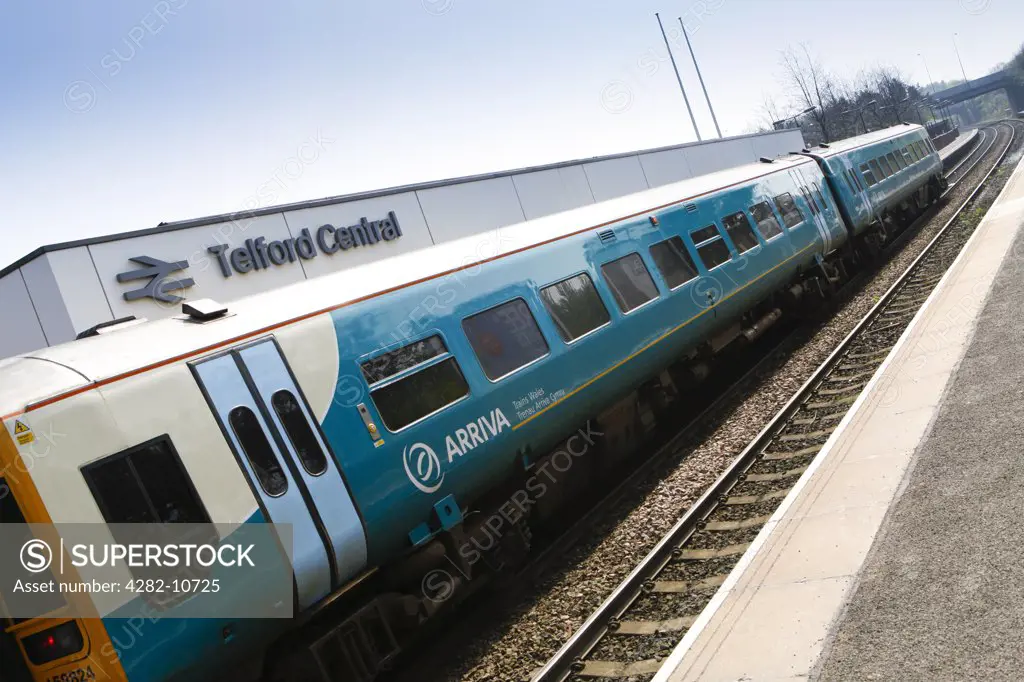 England, Shropshire, Telford. An ARRIVA train alongside a platform at Telford Central railway station.