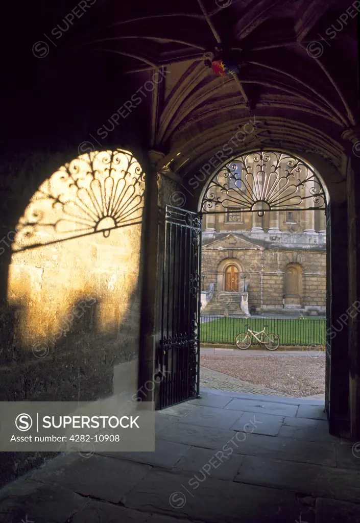 England, Oxfordshire, Oxford. The gate to the Bodleian Library on a summer evening.