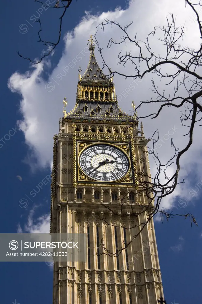 England, London, Westminster. Big Ben with spring moon.