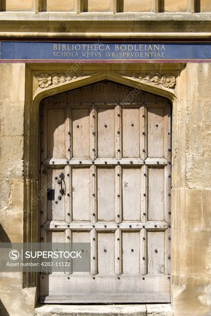 England, Oxfordshire, Oxford. Ancient Door of Bodleian Library. The Bodleian Library is the main research library of the University of Oxford and is one of the oldest libraries in Europe.