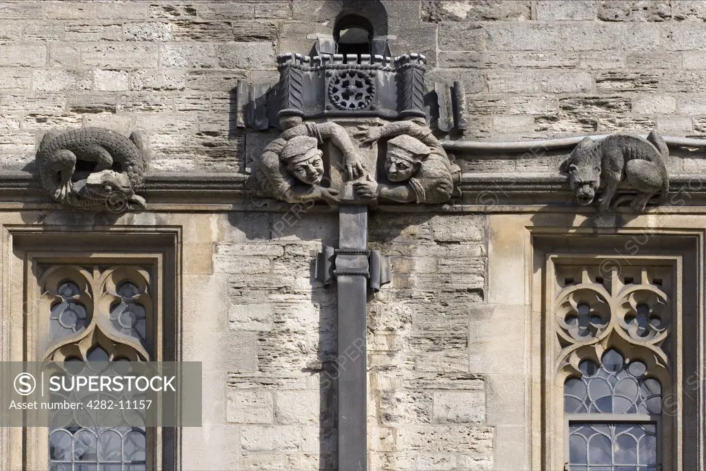 England, Oxfordshire, Oxford. Gargoyles and drains at Brasenose College. The college was originally called Brazen Nose College.
