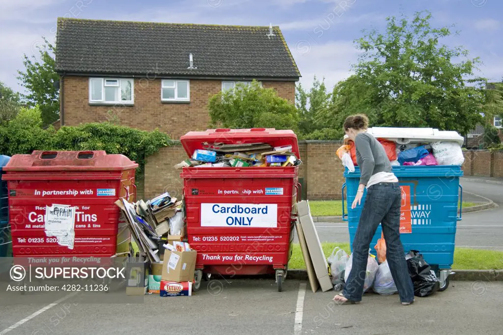 England, Oxfordshire, Abingdon. An overflowing waste recycling point on an Oxfordshire housing estate.