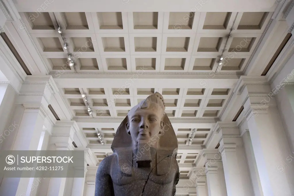 England, London, British Museum. A statue of an Egyptian Pharaoh in the British Museum.