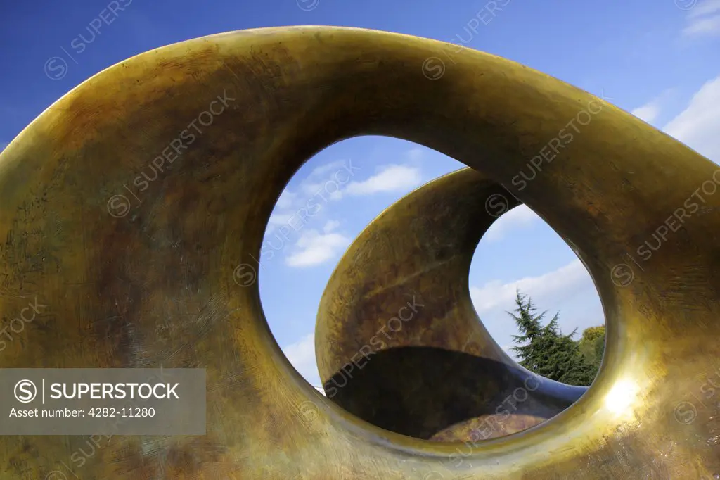 England, Surrey, Kew Gardens. Detail of Double Oval Henry Moore sculpture.