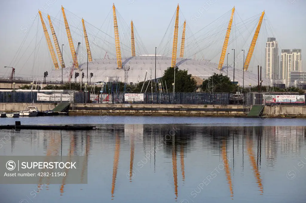 England, London, Docklands. The O2 (formerly known as the Millennium Dome) on the Greenwich peninsula in South East London. The O2 arena inside is one of the largest in Europe and the busiest in the world.