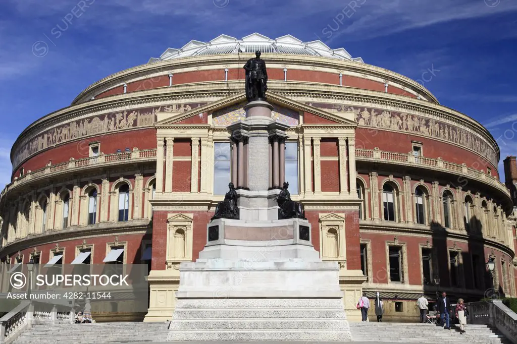 England, London, Kensington. A statue of Prince Albert outside the Royal Albert Hall, opened in 1871 by Queen Victoria. The venue is perhaps best known for holding the annual summer proms since 1941.