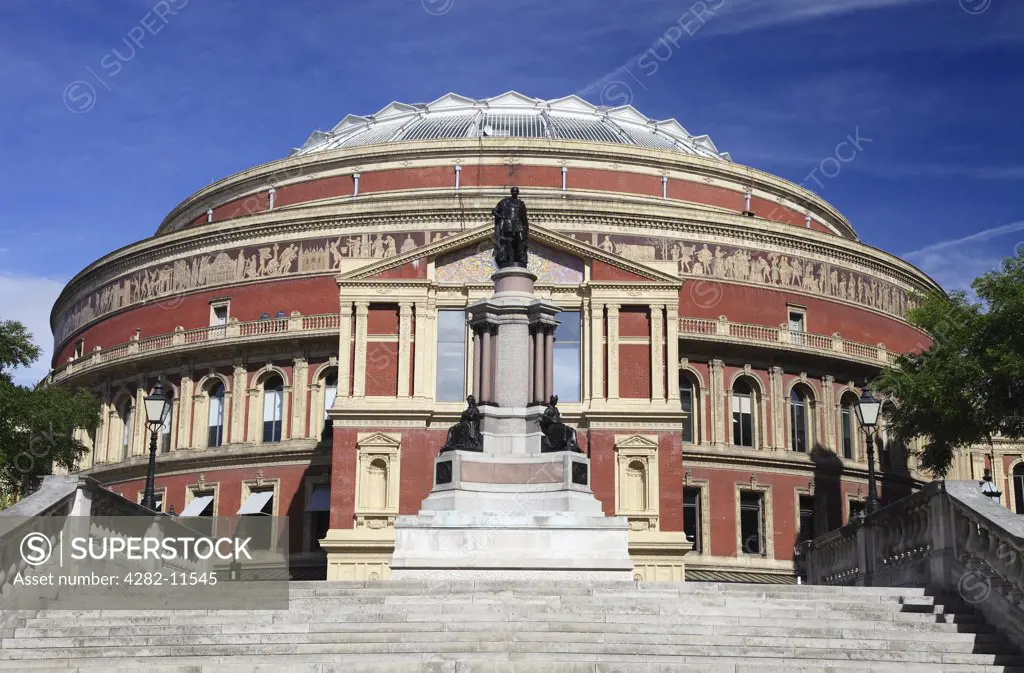 England, London, Kensington. A statue of Prince Albert outside the Royal Albert Hall, opened in 1871 by Queen Victoria. The venue is perhaps best known for holding the annual summer proms since 1941.