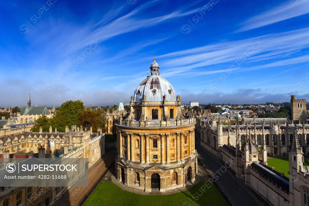England, Oxfordshire, Oxford. Radcliffe Camera and Oxford Colleges viewed from St Mary's Church on an autumn morning.