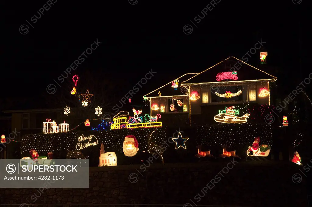 England, Devon, Torquay. A house covered in Christmas lights