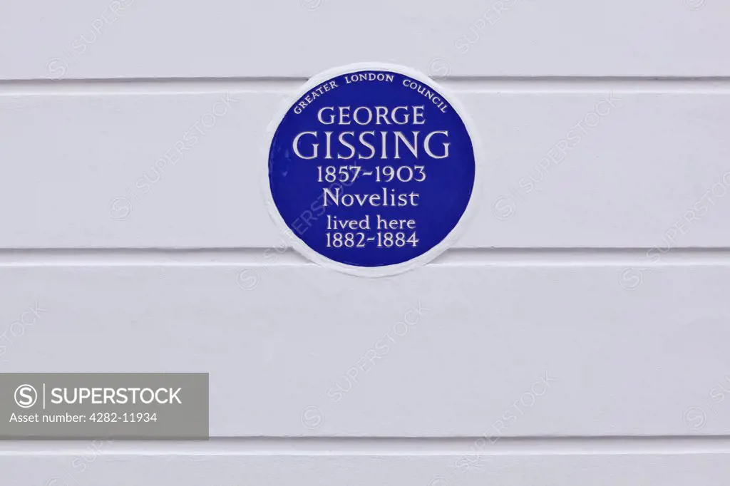 England, London, Chelsea. A Greater London Council (GLC) plaque on the wall of 33 Oakley Gardens celebrating that novelist George Gissing lived in the house between 1882 and 1884.