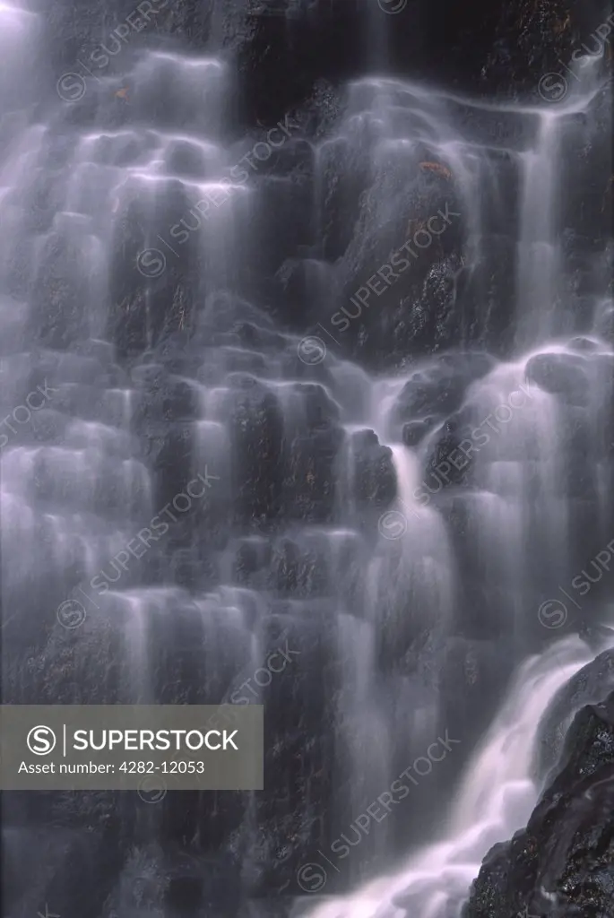 England, Northumberland, Bellingham. The flowing waterfall of Hareshaw Linn within the Northumberland National Park.
