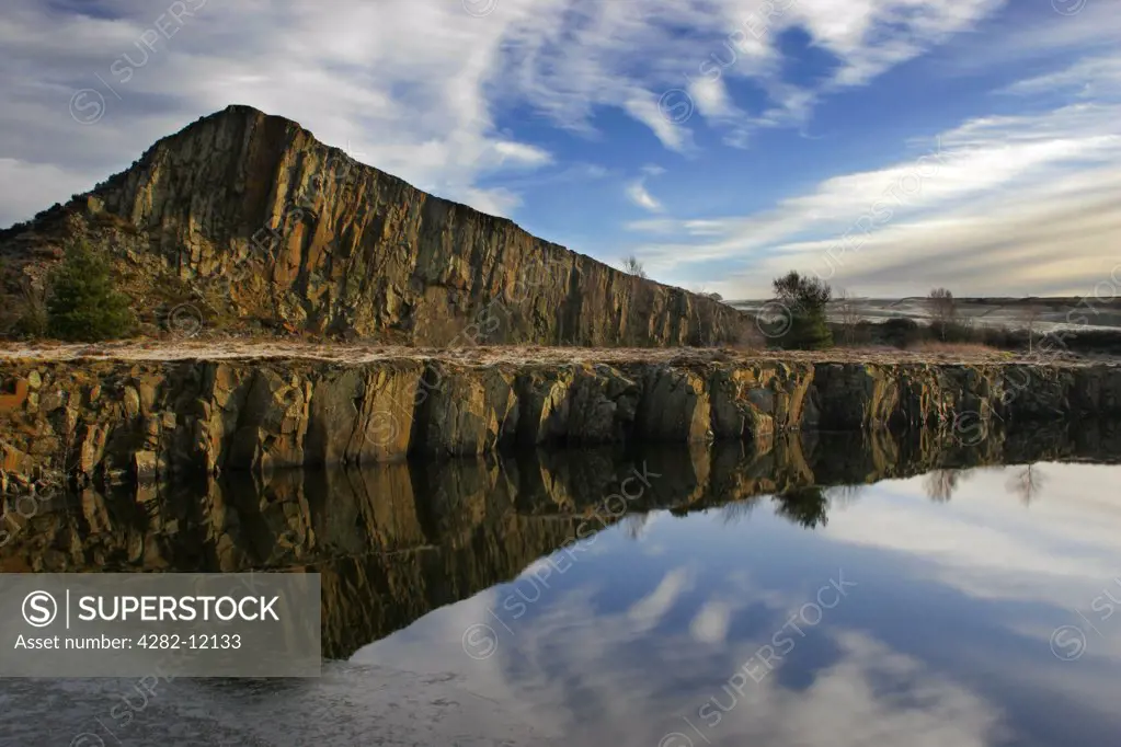 England, Northumberland, Haltwhistle. A winter view of the Great Whin Sill at Cawfields near the town of Haltwhistle.