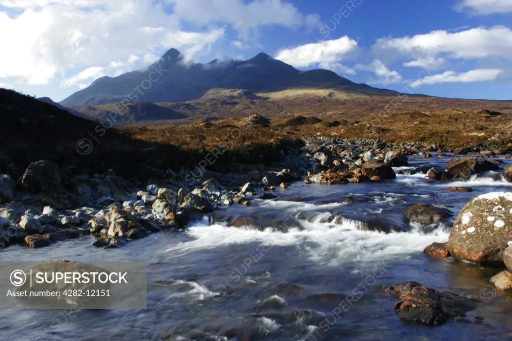 Scotland, Isle of Skye, Sligachan. The River Sligachan flowing through the Glen Sligachan dominated by the Cuillin Mountains.