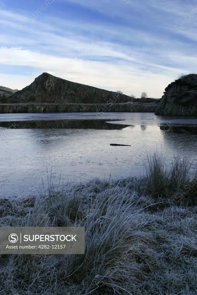 England, Northumberland, Cawfields. A winter view of the Great Whin Sill at Cawfields near the town of Haltwhistle.