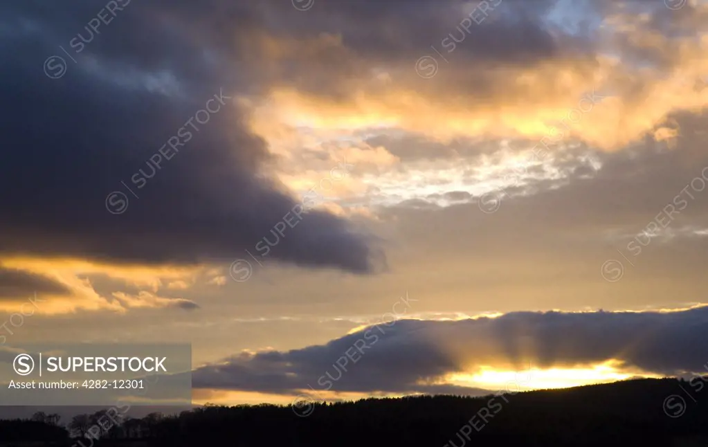 Scotland, Scottish Borders, Kyles Hill. Sunset above Kyles Hill, in the area known as the Mers.