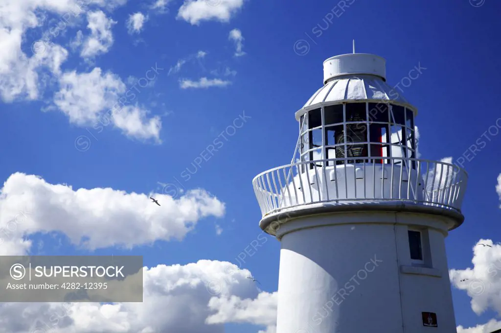 England, Northumberland, Farne Islands. A lighthouse on the Farne Islands, part of the Northumberland Heritage Coast.