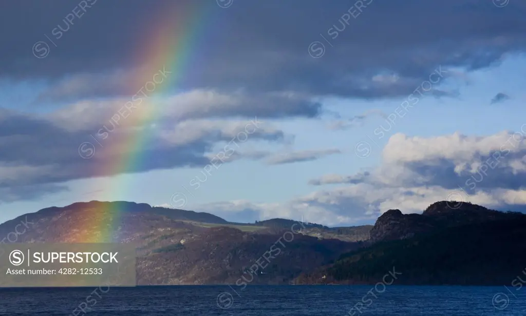 Scotland, Highland, Loch Ness. A rainbow over Loch Ness in the Great Glen.