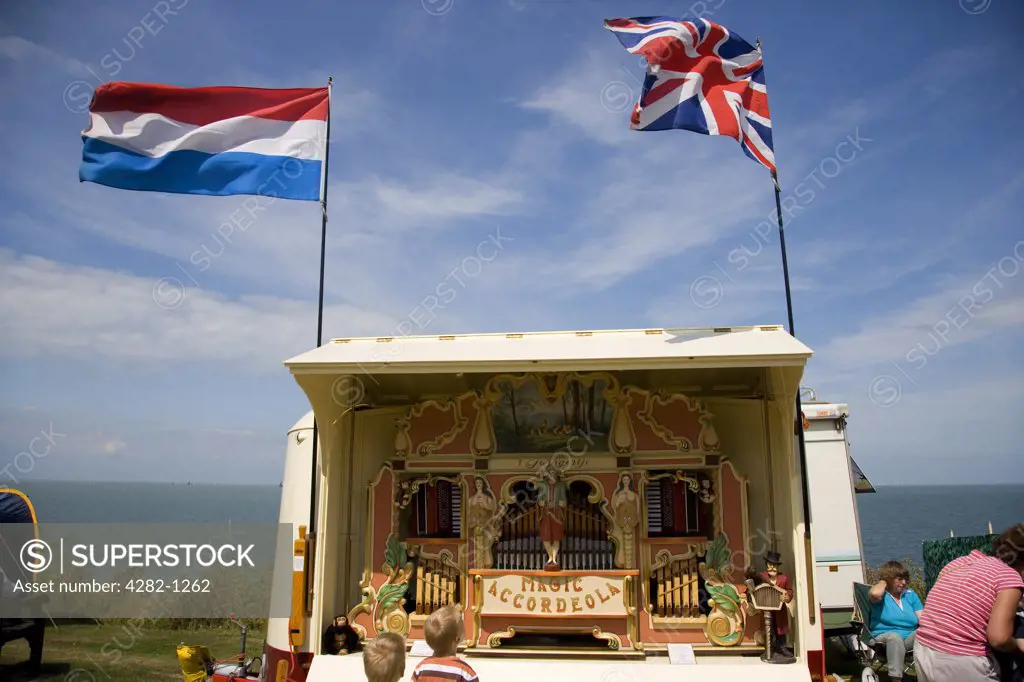 England, Kent, Whitstable. A 41-key Heesbeen 'Magic Accordeola' fair organ by the seafront at a fair in Whitstable.