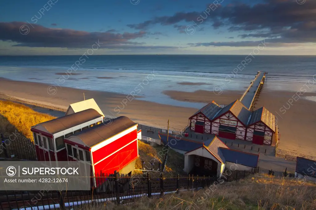 England, Redcar & Cleveland, Saltburn-By-The-Sea. View from the top of the funicular railway, one of the world's oldest water-powered cliff lifts, towards the Victorian Pier and North Sea Beach.