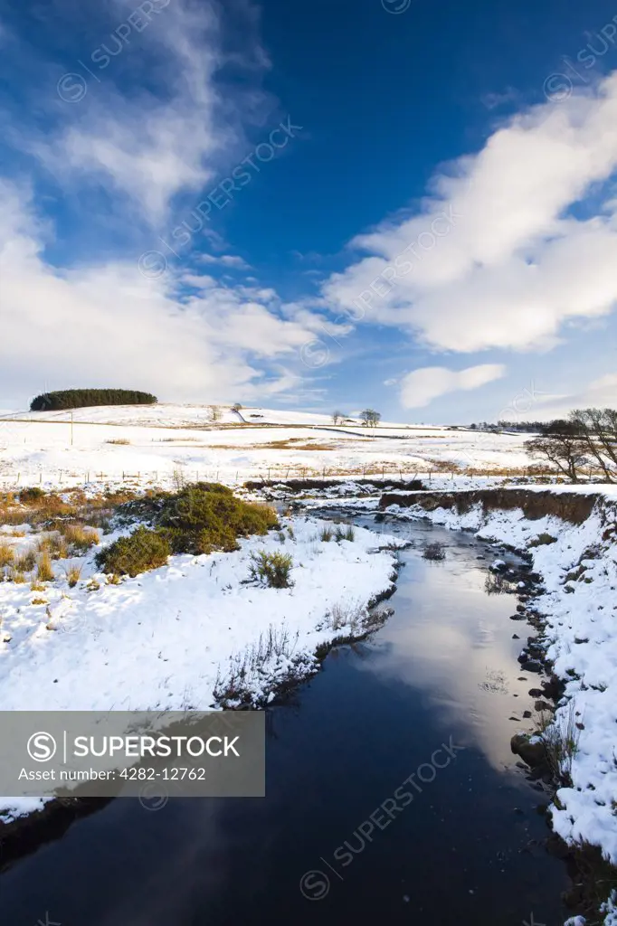 England, Northumberland, near Otterburn. Typical Northumberland scenery near the village of Otterburn, transformed after a winter snowfall.