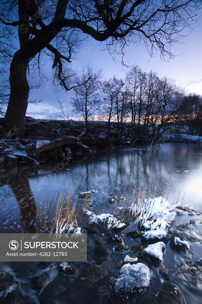 England, Northumberland, near Otterburn. The River Rede near the village of Otterburn at dusk on a mid winter day.