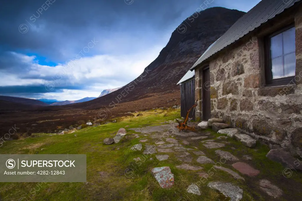 Scotland, Highland, Lairig Ghru. A storm approaches the Corrour Bothy, located along the infamous Lairig Ghru in the Cairngorms National Park.