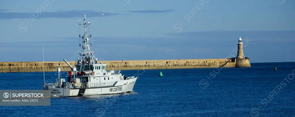 England, Tyne and Wear, South Shields. The HMCC Vigilant, a HM Customs offshore Patrol Vessel, heading towards the North Sea as it exits the mouth of the Tyne at South Shields.
