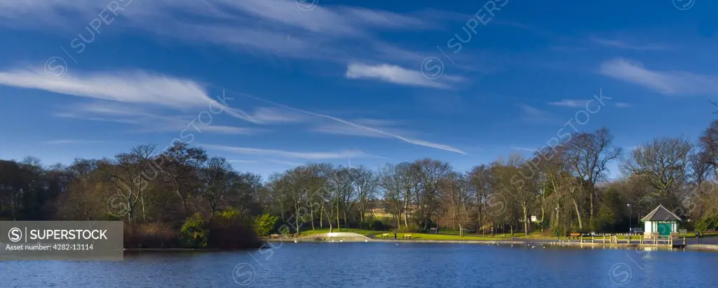 England, Tyne and Wear, Newcastle upon Tyne. Alderman Sir Charles Hamond officially opened Tynesides' first park, Leazes Park in 1873. The lake pictured here was created along the line of the Lort Burn.