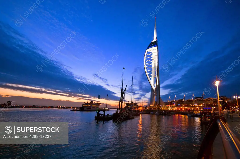 England, Hampshire, Portsmouth. An early evening view of the 170m high Spinnaker Tower at Gunwharf Quays in Portsmouth Harbour.