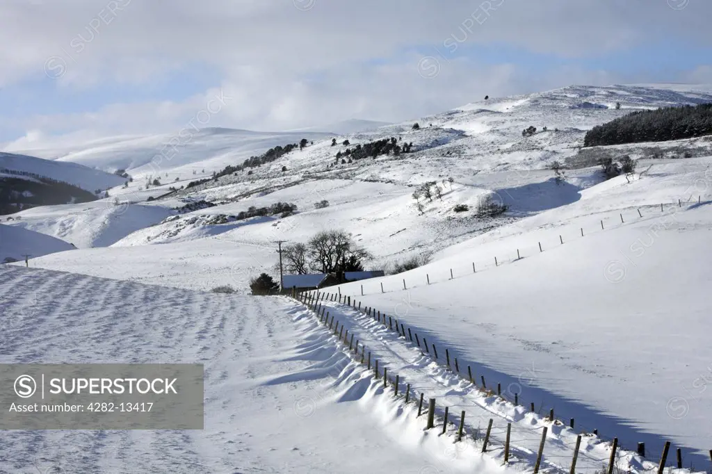 Scotland, Aberdeenshire, Cabrach. A snow covered road in Cabrach.